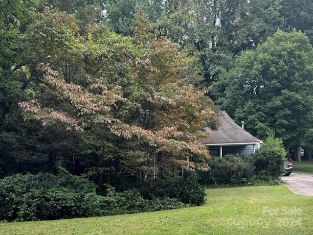 exterior space with a lawn