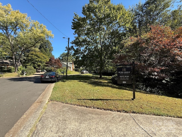 view of road featuring curbs