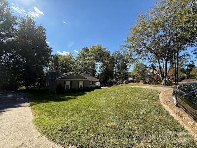 exterior space with a front yard