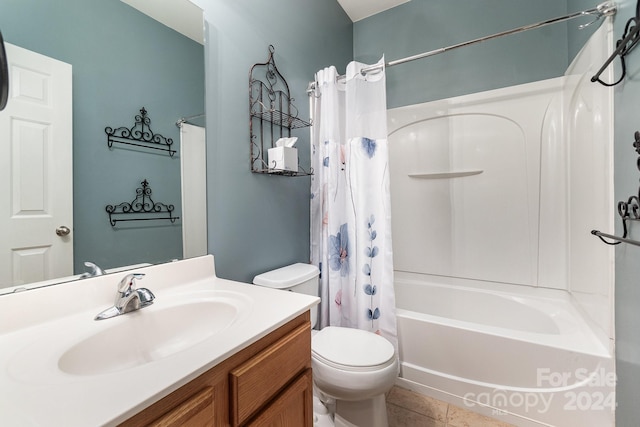 full bathroom with vanity, toilet, shower / bathtub combination with curtain, and tile patterned floors