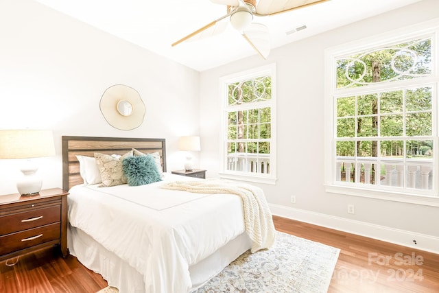 bedroom featuring ceiling fan and light hardwood / wood-style flooring