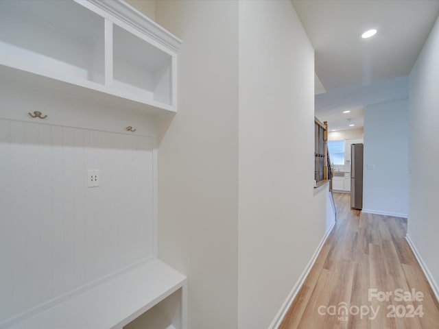 mudroom featuring light hardwood / wood-style flooring