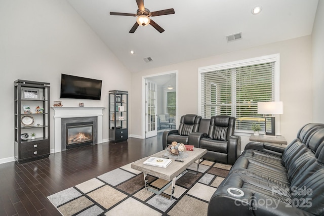 living room with high vaulted ceiling, hardwood / wood-style floors, and ceiling fan