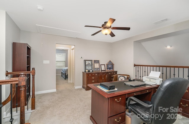 office with light carpet and ceiling fan