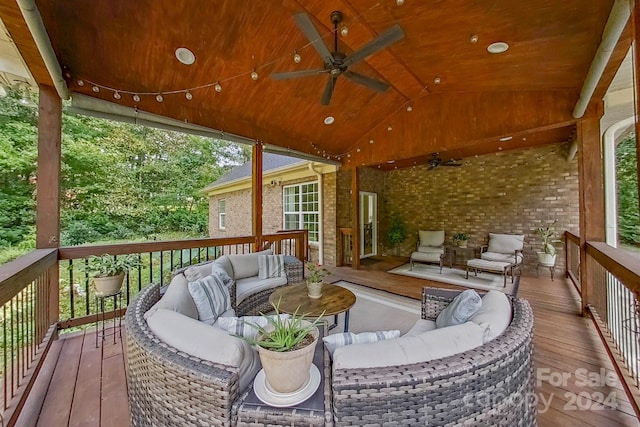 deck with ceiling fan and an outdoor hangout area