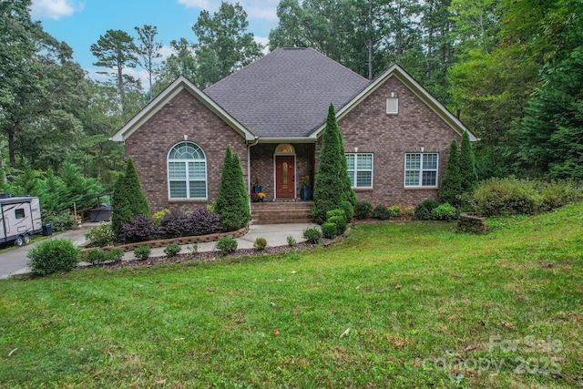 10604 Russet Pl, Charlotte, NC 28227 - view of front of house featuring brick siding, a front yard, and a shingled roof