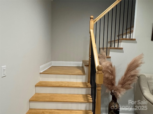 10604 Russet Pl, Charlotte, NC 28227 - stairs with wood finished floors and baseboards