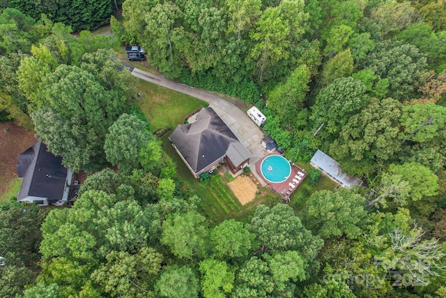 10604 Russet Pl, Charlotte, NC 28227 - aerial view of property and surrounding area featuring a heavily wooded area