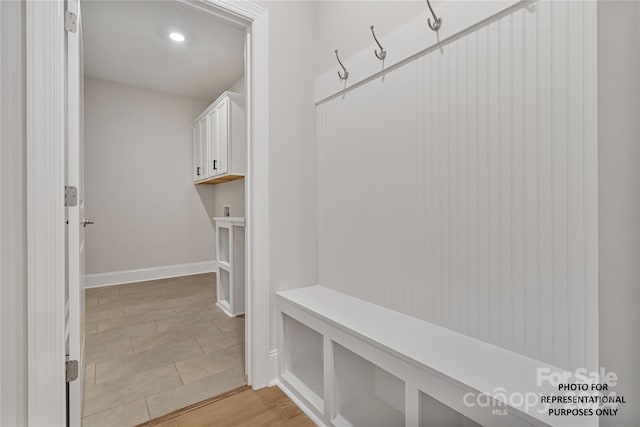 mudroom featuring baseboards and recessed lighting