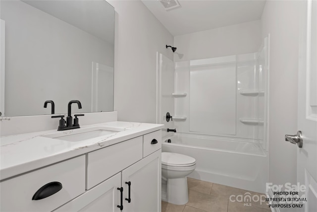 full bathroom with tile patterned floors, vanity,  shower combination, and toilet