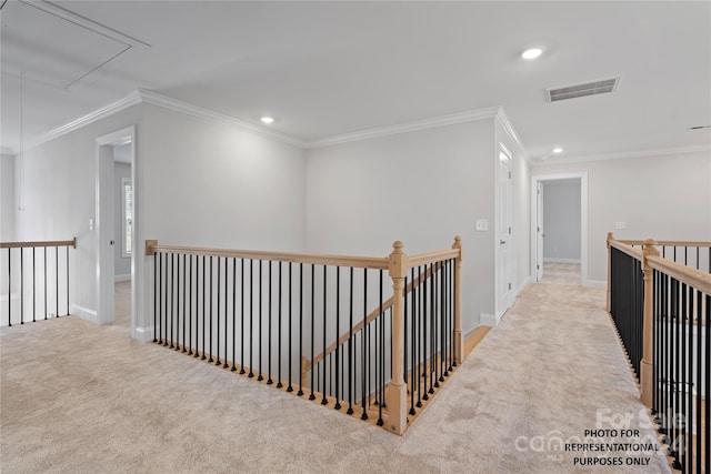 hallway featuring light carpet and ornamental molding