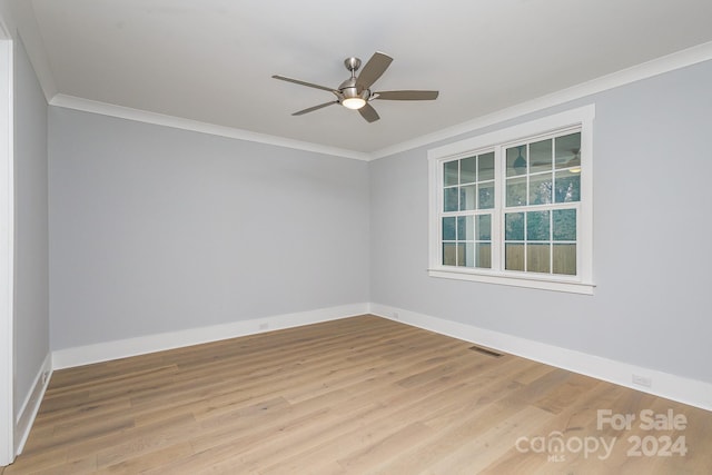 unfurnished room with ceiling fan, ornamental molding, and light hardwood / wood-style floors