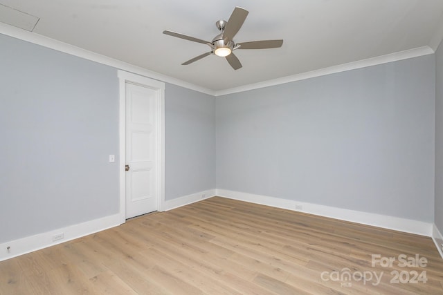 empty room with light hardwood / wood-style flooring, ceiling fan, and ornamental molding