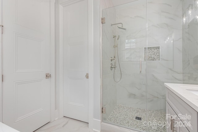 2305 Sanders Ave, Charlotte, NC 28216 - full bathroom with marble finish floor, vanity, and a marble finish shower