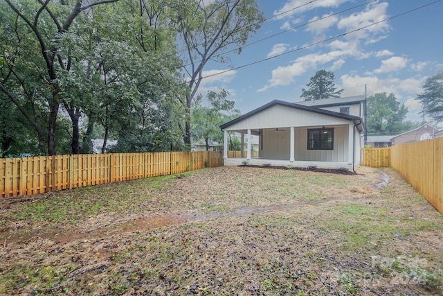 2305 Sanders Ave, Charlotte, NC 28216 - rear view of house with a fenced backyard