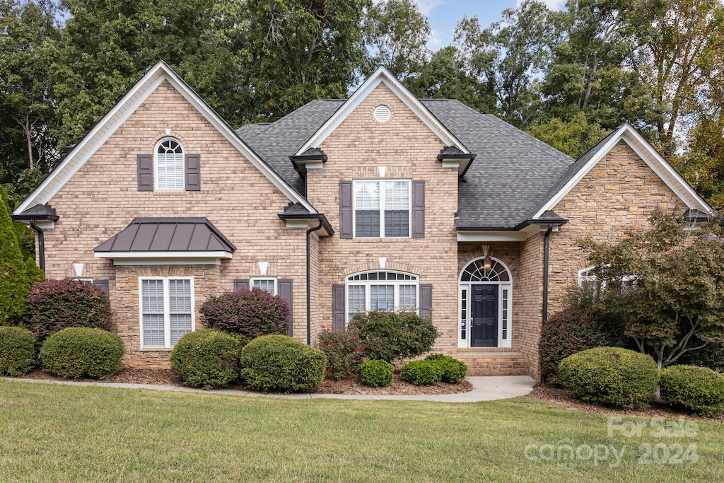 view of property with a front yard