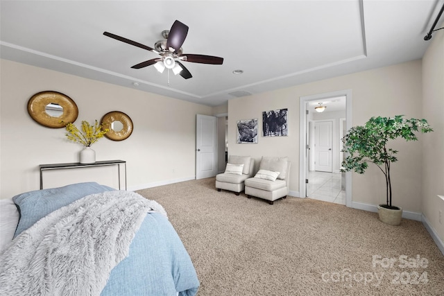 bedroom featuring ceiling fan and light colored carpet