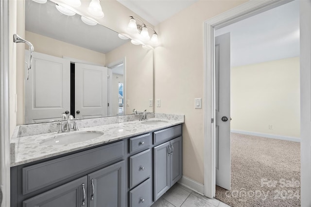 bathroom featuring vanity and tile patterned flooring