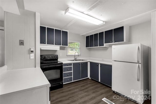 kitchen featuring black electric range oven, sink, dark wood-type flooring, and white refrigerator