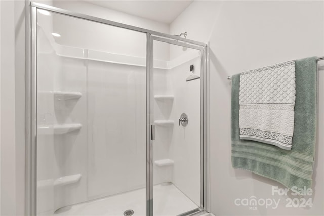 bathroom with an enclosed shower