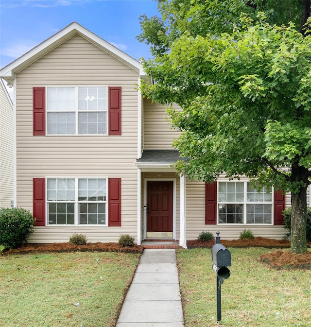 view of front of property with a front yard