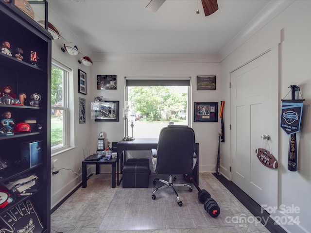 home office with ceiling fan and a wealth of natural light