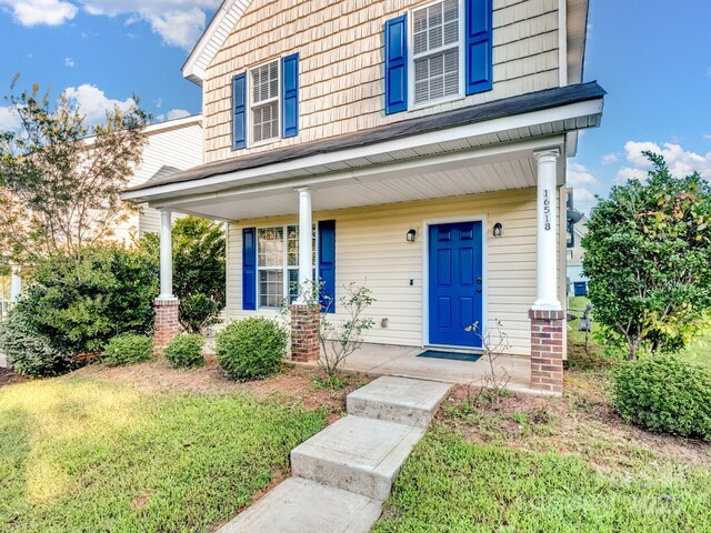 view of front of house featuring covered porch