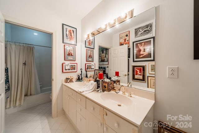 full bathroom featuring shower / bathtub combination with curtain, tile patterned floors, vanity, and toilet