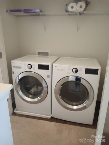 washroom featuring separate washer and dryer