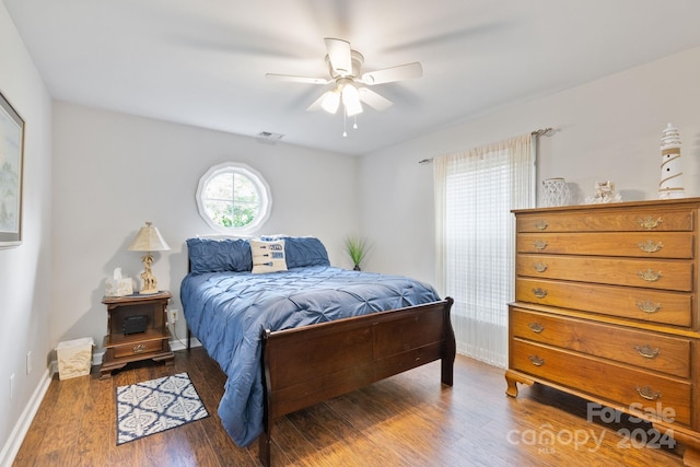 bedroom featuring ceiling fan and hardwood / wood-style floors