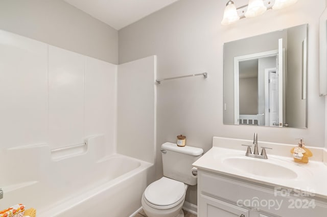 full bathroom featuring shower / bathing tub combination, vanity, and toilet