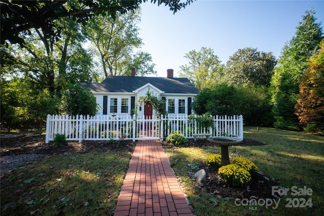 exterior space with a front lawn