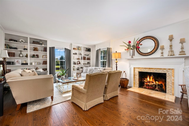 living room featuring hardwood / wood-style floors and a fireplace