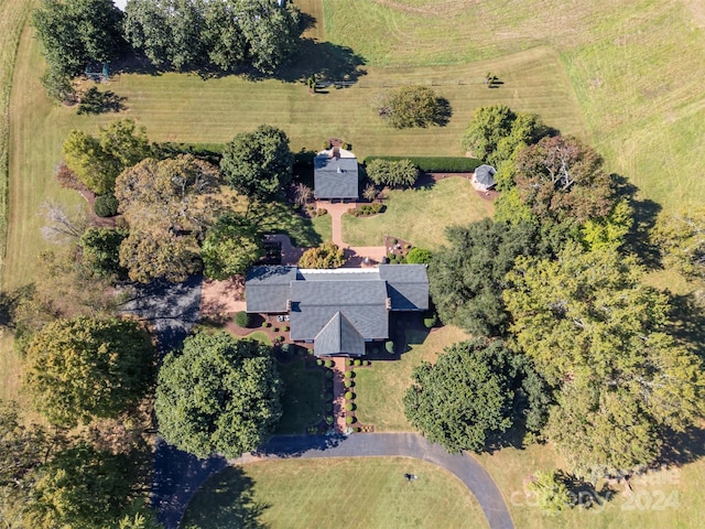 birds eye view of property featuring a rural view