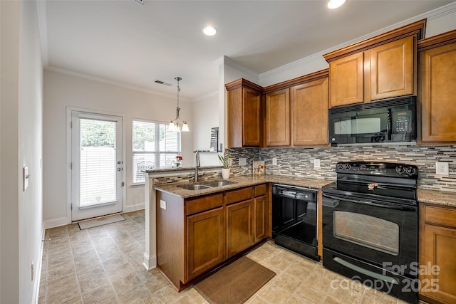 kitchen with sink, crown molding, tasteful backsplash, black appliances, and kitchen peninsula