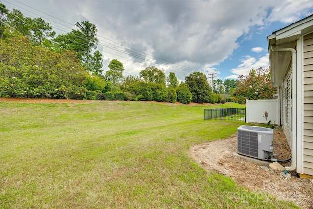 view of yard with central AC unit