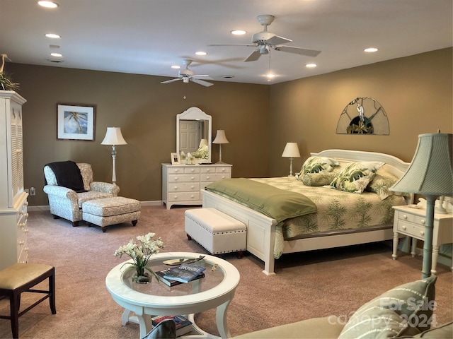 carpeted bedroom featuring ceiling fan