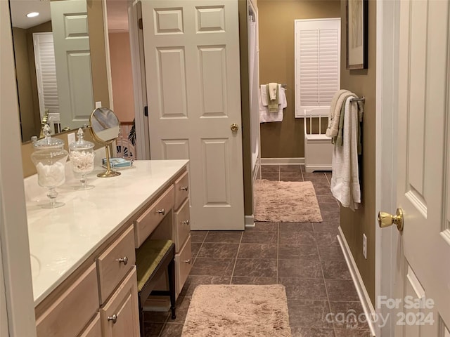 bathroom featuring vanity and tile patterned floors