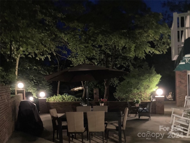 view of patio at twilight