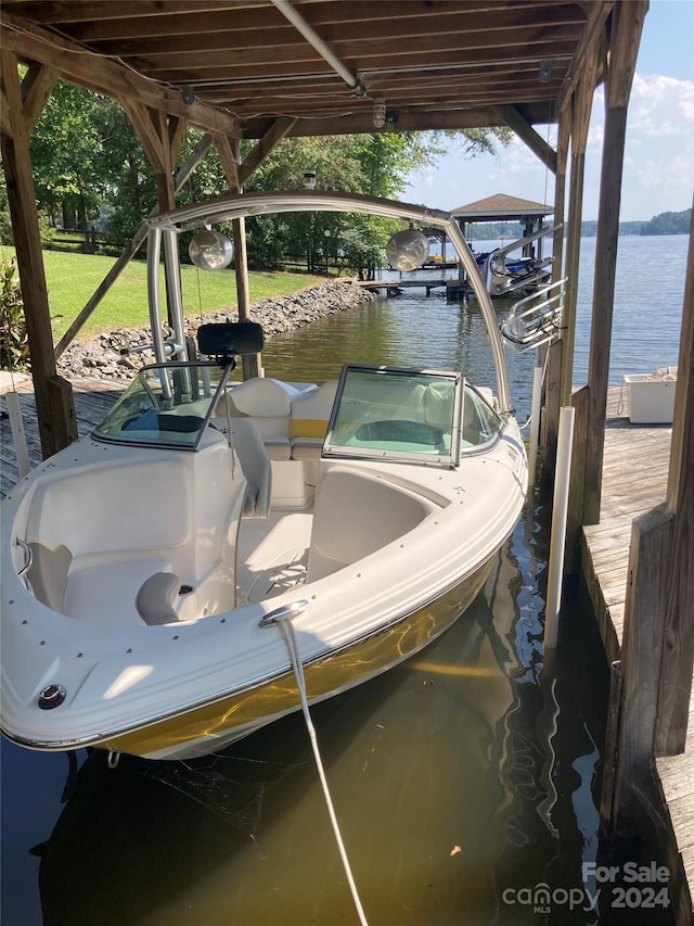 view of dock with a water view