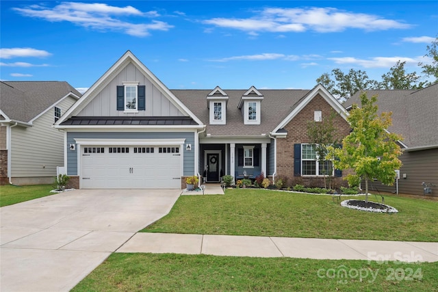 craftsman house with a front lawn