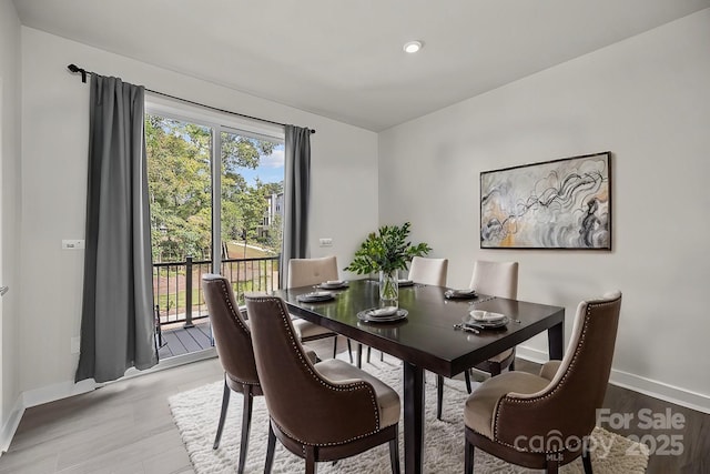 dining room featuring light wood-type flooring