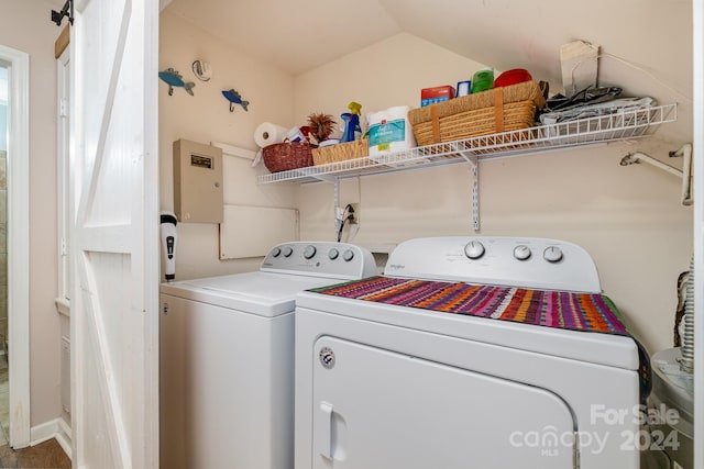 laundry area with washing machine and dryer