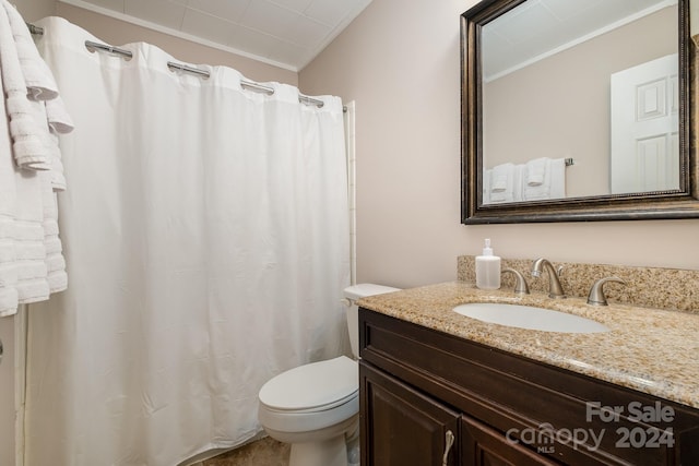 bathroom with curtained shower, crown molding, vanity, and toilet