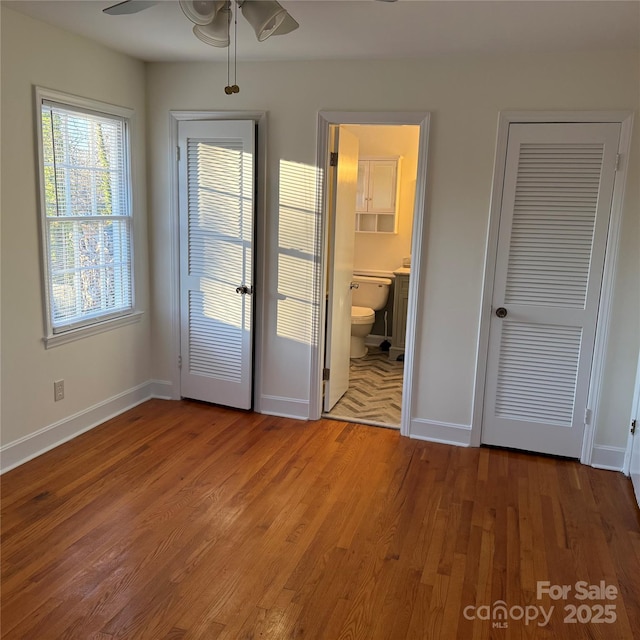 entryway featuring hardwood / wood-style floors and ceiling fan