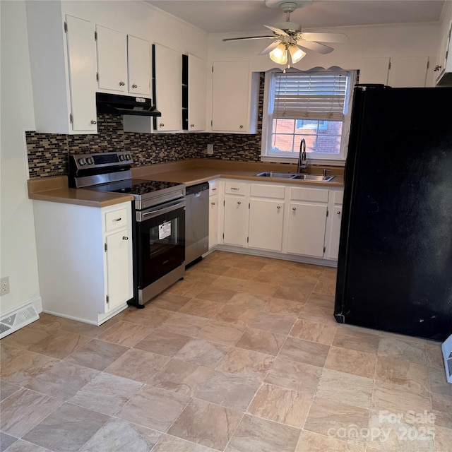 kitchen with white cabinets, ceiling fan, sink, and stainless steel appliances