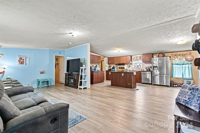 7686 Hickory Creek Dr, Denver, NC 28037 - living area featuring light wood-style floors and a textured ceiling
