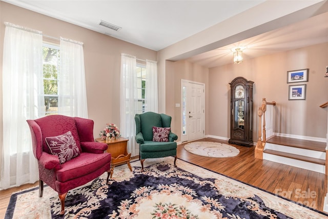 sitting room featuring hardwood / wood-style floors