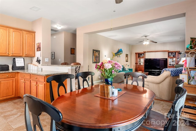 dining area featuring ceiling fan