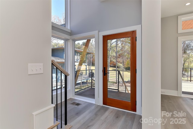 doorway to outside featuring light hardwood / wood-style flooring